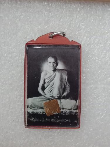 รูปถ่ายหลวงพ่อกวย หลังยันต์ตุ๊กตา  ออกที่วัดโฆษิตารามปี2558 