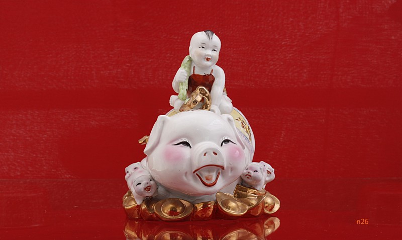 ตุ๊กตาเด็กขี่หมู กองทองคำ ของเมืองจีน