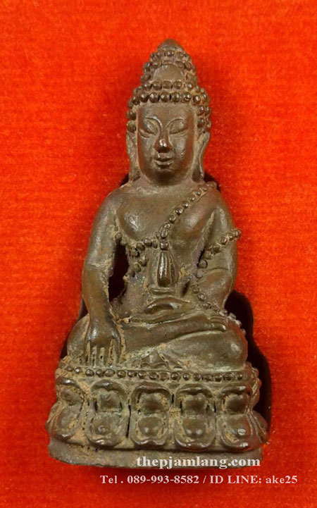พระกริ่งรวยทันใจ หลวงปู่สอ ขันติโก วัดโพธิ์ศรี ท่าอุเทน นครพนม เนื้อนวะก้นเงิน ปี 2561