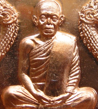 เหรียญเสมาพญานาค หลวงพ่อคูณ ปี2557รุ่น"มหาเศรษฐี"หลังฝังตะกรุด เนื้อทองแดงผิวไฟ หมายเลข5518+กล่อง