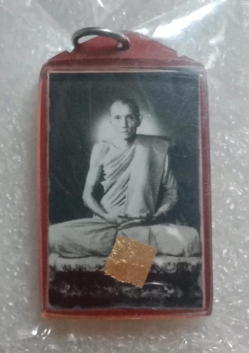 รูปถ่ายหลวงพ่อกวย หลังยันต์ตุ๊กตาคู่ ออกที่วัดโฆษิตารามปี2558