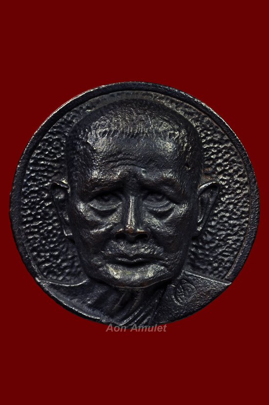 เหรียญหล่อหลังพระปิดตาเนื้อนวโลหะ รุ่น มหาเศรษฐี หลวงปู่แหวน สุจิณฺโณ วัดดอยแม่ปั๋ง พศ.2521