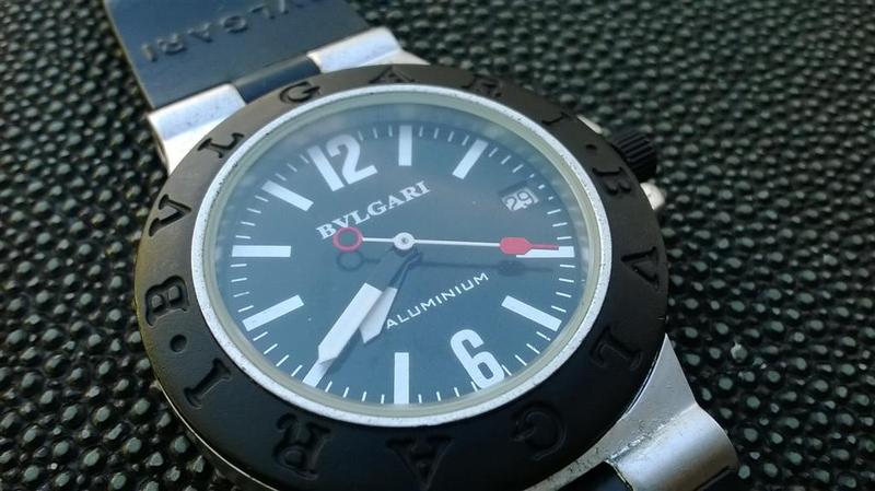 นาฬิกา BVLGARI หน้าปัดดำ เข็มวิปลายแดง ดีไซน์สวยมากๆ