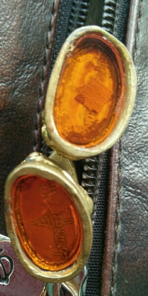 พระกริ่ง100ปีเนื้อทองทิพย์ ตอกโค๊ตหมายเลขกำกับ 2องค์ครับ