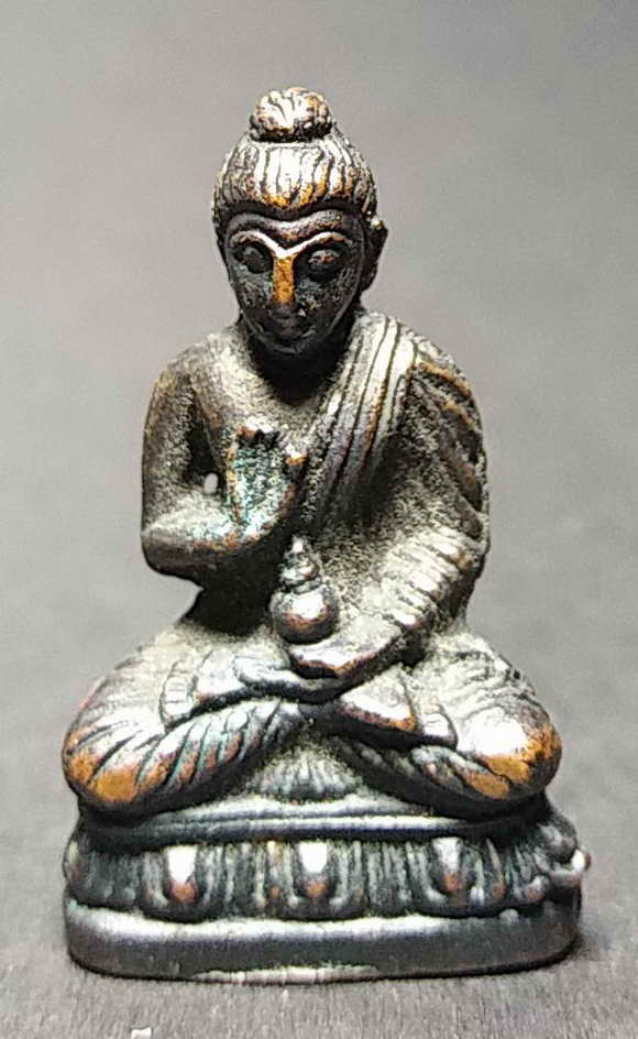 20 บาทรูปหล่อพระพุทธหน้าอินเดีย ปางดีดน้ำมนต์ไม่ทราบที่