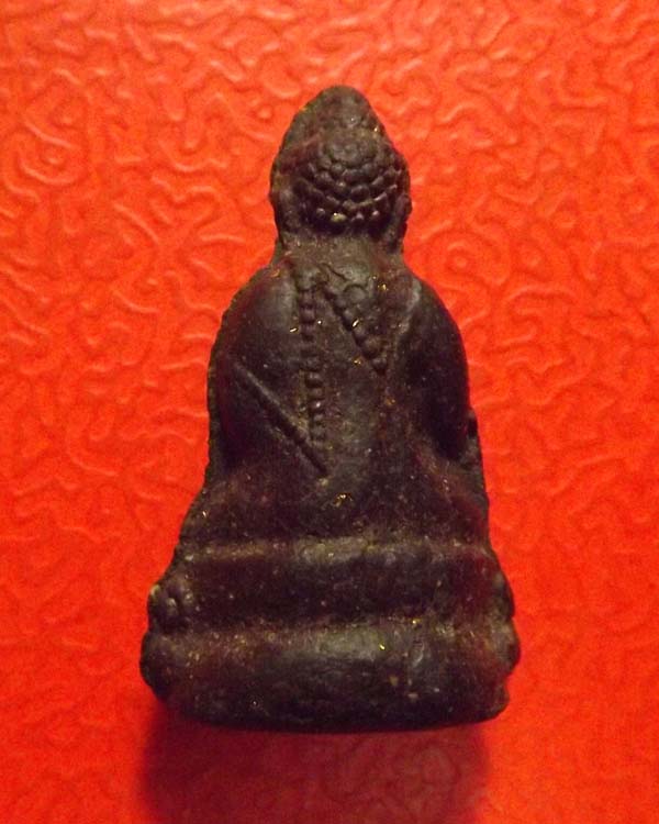 พระกริ่งเนื้อผงรุ่นแรก หลวงปู่คำพัน ปี2518 ผงคลุกรักดำ