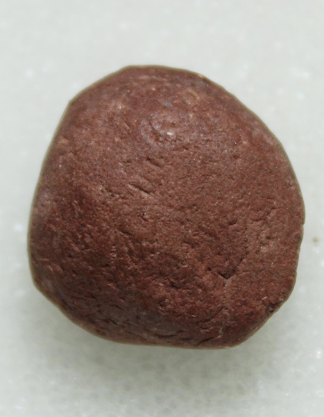 พระปิดตา เม็ดบัว เนื้อแดง ไม่ทราบที่