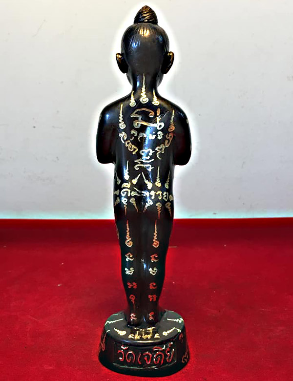 รูปหล่อตาไข่เด็กวัดเจดีย์สภาพสวย เนื้อโลหะจารยันต์รอบตัว กว้าง 1.5 นิ้วสูง 7 นิ้วใต้ฐานอุดดินไทย ...