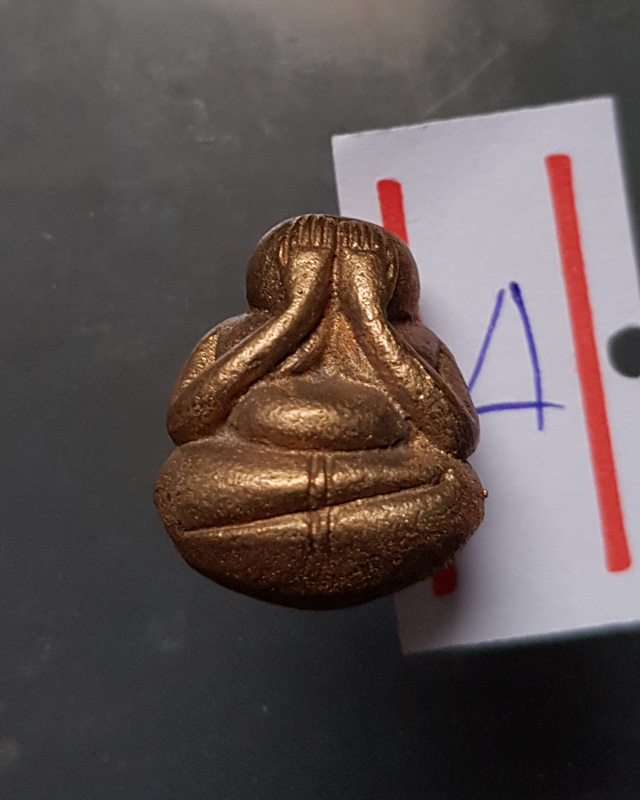 พระปิดตาล้มลุก ที่ระลึกในงานครบรอบอายุ 76 ปี หลวงปู่คำพันธ์ วัดธาตุมหาชัย ปี 2534