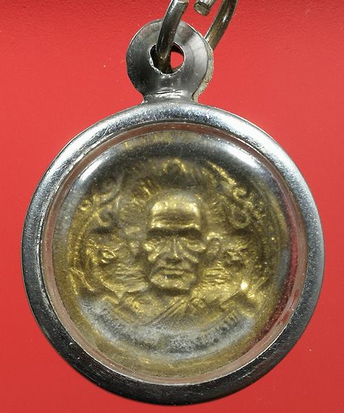 เหรียญล้อแม็ก ( พิมพ์เล็ก ) หลวงพ่อเงินบางคลาน รุ่น ๑ พิเศษ ปี พศ.2535 พร้อมกรอบ