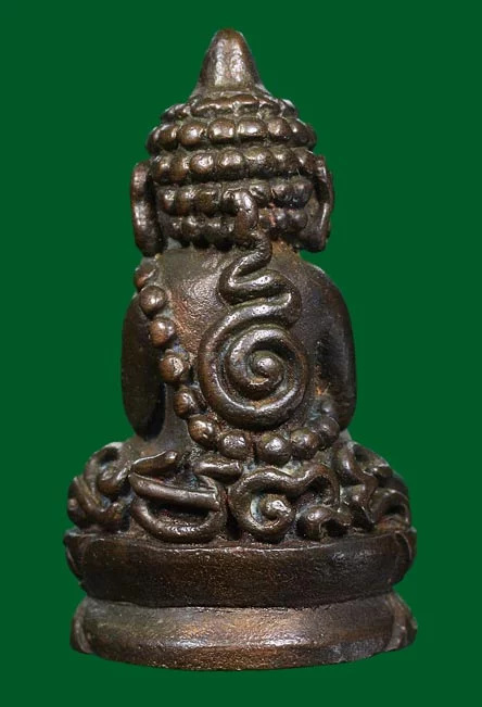 พระปิดตาหัวจรวด เนื้อนวะโลหะ หลวงปู่เหมือน วัดกำแพง ชลบุรี ปี2527 หมายเลข1289 สวยมากครับ