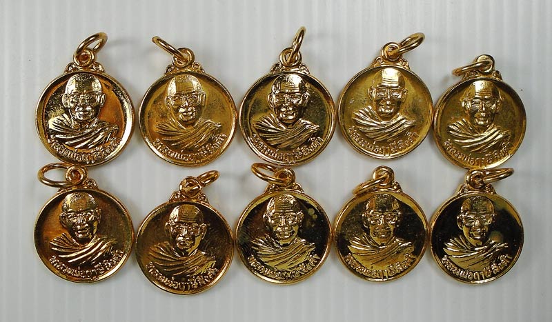 20บาท..เหรียญกลมหลังยันต์เกราะเพชร หลวงพ่อฤาษีลิงดำ วัดท่าซุง.... 10 เหรียญ (ชุดที่3)