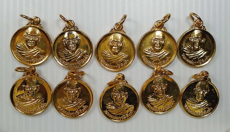 20บาท..เหรียญกลมหลังยันต์เกราะเพชร หลวงพ่อฤาษีลิงดำ วัดท่าซุง.... 10 เหรียญ (ชุดที่4)