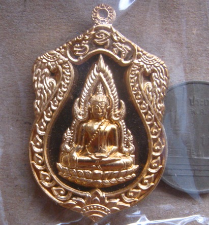 เหรียญเสมา พระพุทธชินราช รุ่นจอมราชันย์ เนื้อทองทิพย์ ปี2555 หมายเลข3789 พร้อมกล่องเดิม