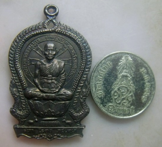 **วัดใจ**เหรียญนั่งพาน หลวงปู่คำพันธ์ รุ่นปัญญาบารมี วัดธาตุมหาชัย จ.นครพนม ปี ๒๕๓๗**ตอกโค้ด สวยๆ