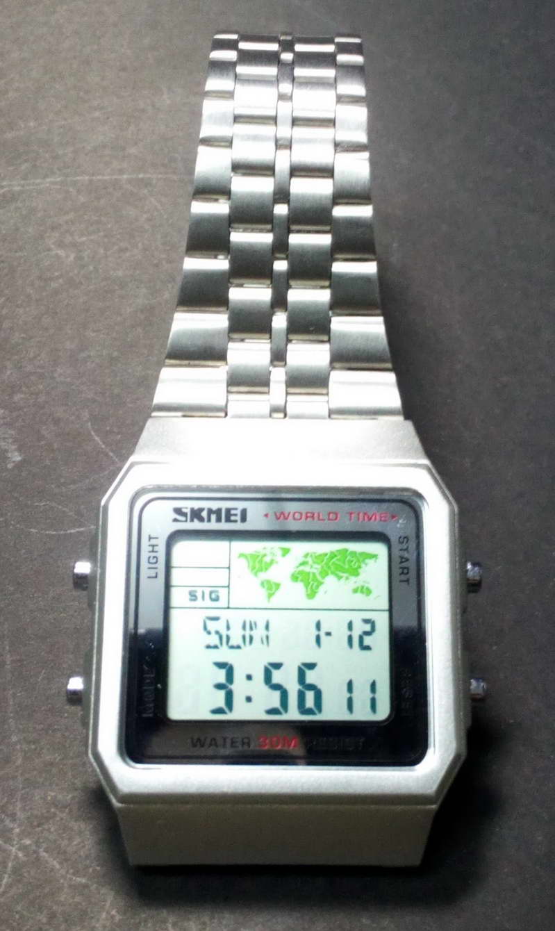 SKMEI นาฬิกาข้อมือ รุ่น SKMEI 1338 สายสแตนเลส   เจ๋งสุดๆด้วยฟังก์ชั่น World Time ดูเวลาโลก