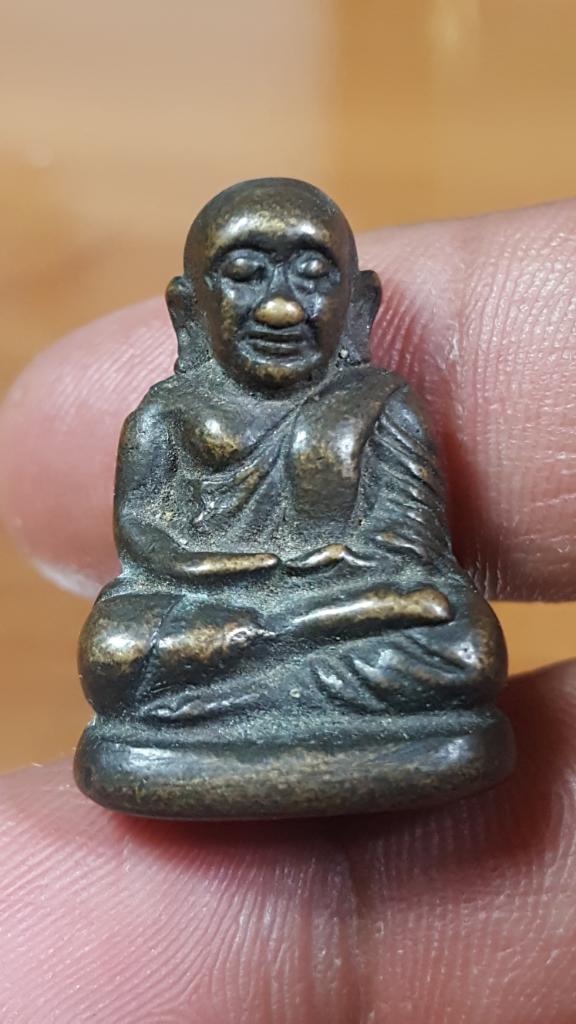 รูปหล่อเหมือนหลวงพ่อเงินเนื้อทองผสม รมดำเก่า ไม่ทราบวัด