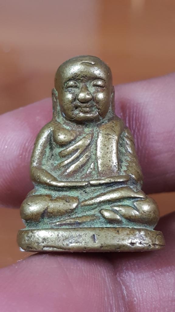 รูปหล่อเหมือนหลวงพ่อเงินหน้ายิ้ม เนื้อทองผสมไม่ทราบวัด