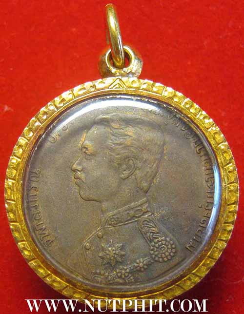 เหรียญรัชกาลที่ ๕ ร.ศ.๑๒๒ พระเศียรตรงกันเลี่ยมทองคำแท้พร้อมบัตรรับรองพระแท้*258