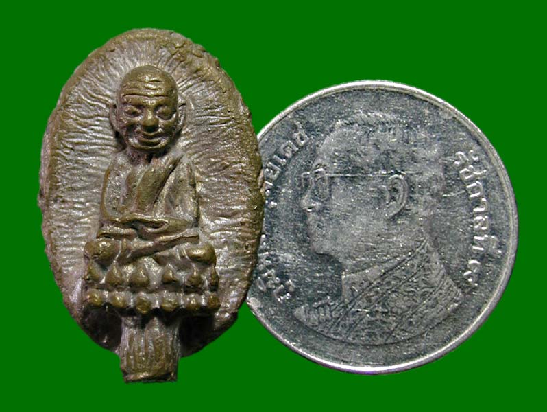 หลวงพ่อทวดหลังพระปิดตาอาจารย์คลังแสงวัดเขากุฏิปี 53 ........เคาะเดียวแดง              