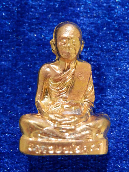 รูปเหมือนปั๊มหลวงพ่อคูณ ปริสุทโธ รุ่นปาฎีหาริย์EOD เนื้อทองสัตตะ ปี2556