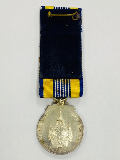 เหรียญในหลวงรัชกาลที่ 9ที่ระลึกประดับแพรแถบ พระราชพิธีมหามงคลเฉลิมพระชนมพรรษา 7รอบ 5 ธันวาคม 2554