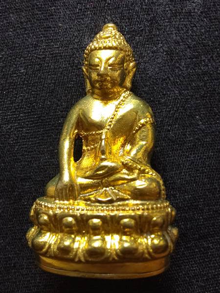 พระกริ่งหลวงพ่อคูณ รุ่น คูณพันล้าน ออกวัดบ้านไร่ ปี 57 เนื้อ ทองฝาบาตรก้นอุดยันต์ดวง หมายเลข 1068 สร