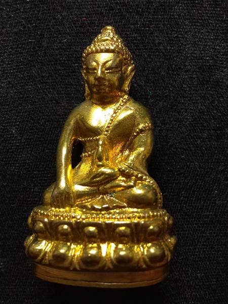 พระกริ่งหลวงพ่อคูณ รุ่น คูณพันล้าน ออกวัดบ้านไร่ ปี 57 เนื้อ ทองฝาบาตรก้นอุดยันต์ดวง หมายเลข 1074 สร