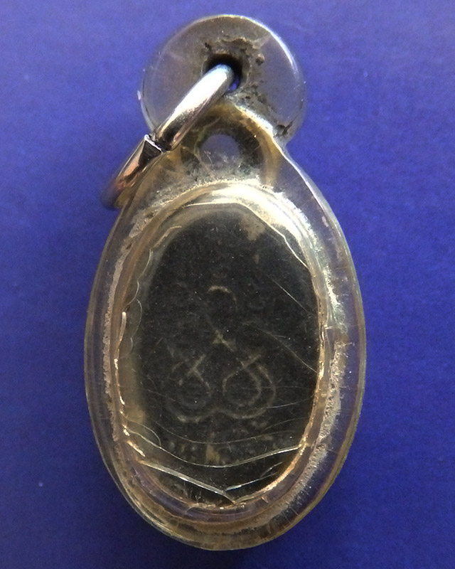 เหรียญเม็ดแตง หลวงพ่อโสธร เนื้อเงิน ปี 2525 เลี่ยมเก่า