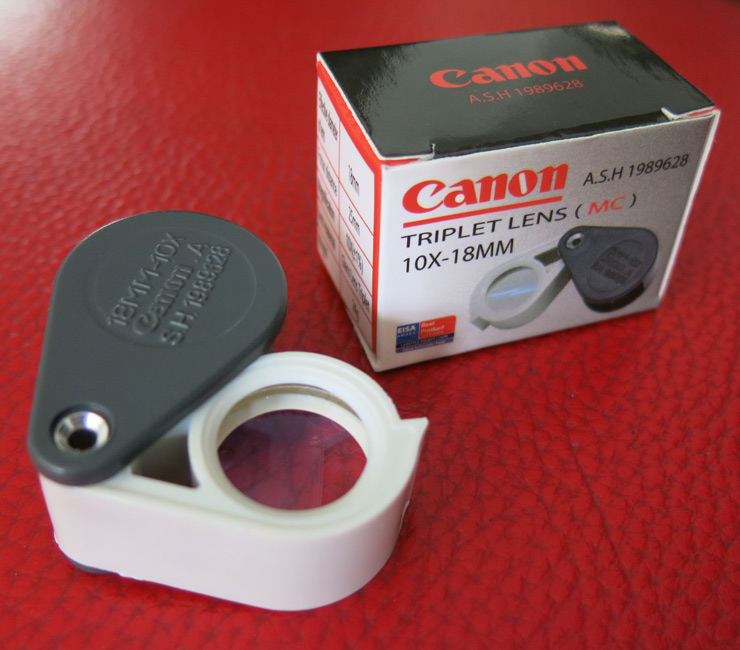 กล้องส่องพระ Canon A.S.H. 1989628 10X - 18 mm. ขนาดเลนส์ กว้าง 18 mm. - สีเทา-สีขาว