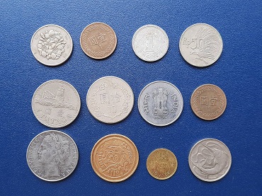 เหรียญต่างประเทศ คละๆ ปีเก่าๆ น่าสะสม รวม 12 เหรียญ๑