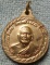 เหรียญครูบาพิณ หลังพระเจ้าทันใจ วัดพระธาตุดอยคำ จ.เชียงใหม่