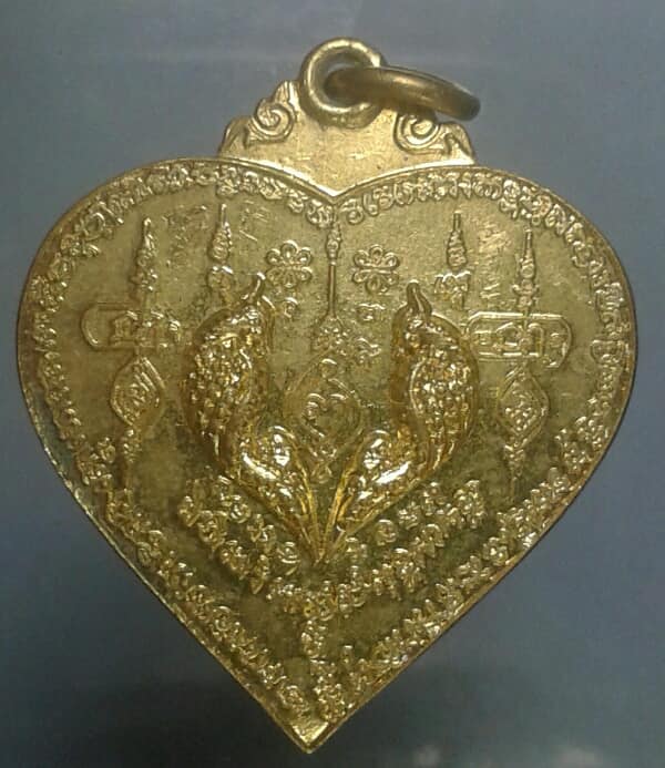 เหรียญนกสาลิกา ตอกโค้ตด้านหลัง กะไหล่ทอง ไม่ทราบที่     เคาะเดียวแดงครับ