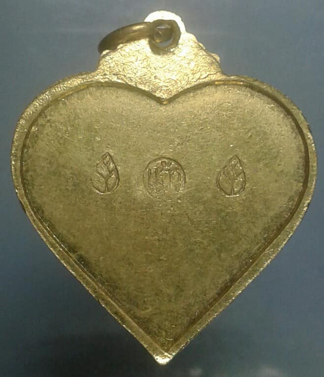 เหรียญนกสาลิกา ตอกโค้ตด้านหลัง กะไหล่ทอง ไม่ทราบที่     เคาะเดียวแดงครับ