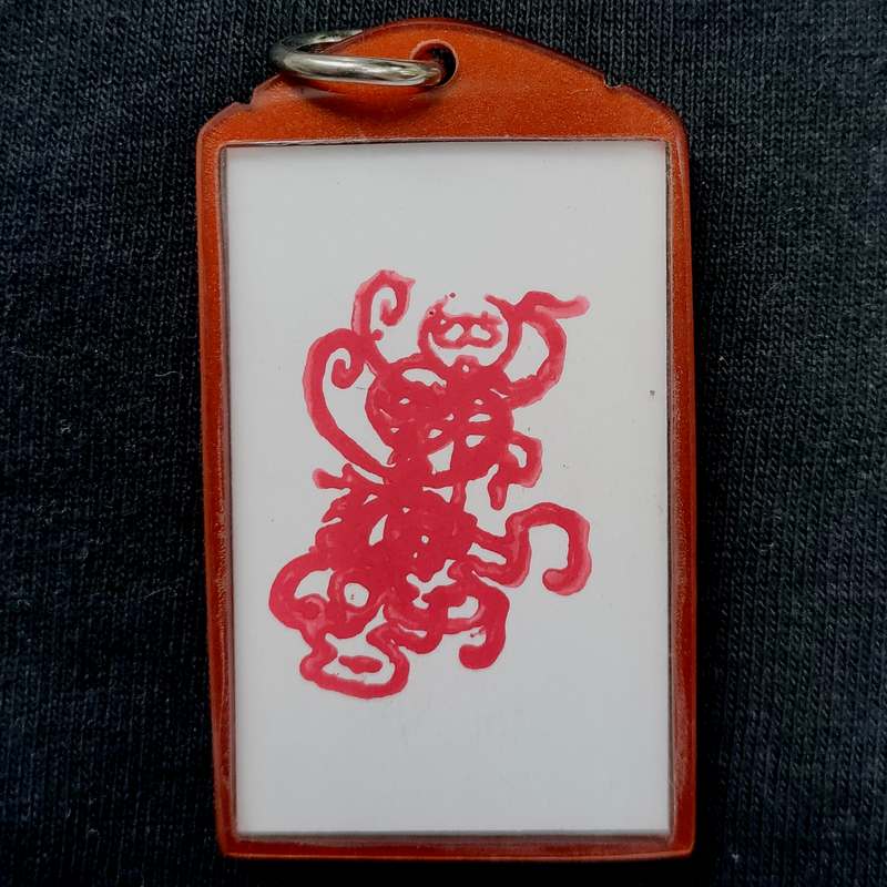 รูปถ่ายรุ่นนิยมหลังตะวัน หลวงพ่อกวย วัดโฆสิตาราม จ.ชัยนาท ออกปี 2558 พิเศษหลังปั๊มยันต์คู่