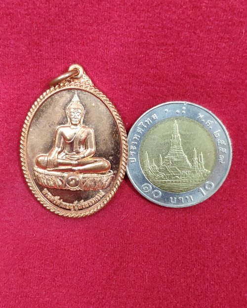 เหรียญพระศรีศากยมุนีศรีธรรมราช ปี49 หลังตอกโค๊ต วัดพระมหาธาตุวรมหาวิหาร จ.นครศรีธรรมราช