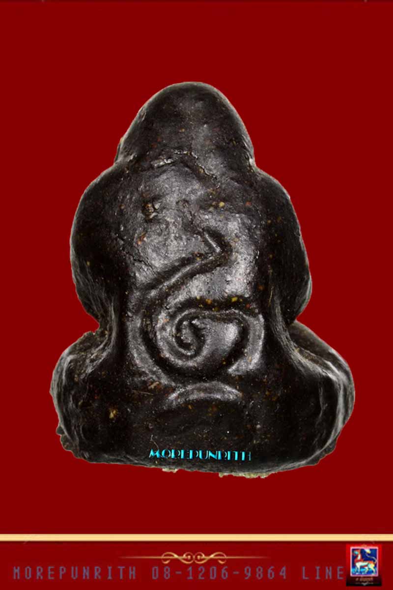 พระปิดตาว่านผสมชันโรง(ยุคแรก) ด้านหลังยันต์(จม) พ่อท่านเตื้อน สำนักสงฆ์พวงเพ็ญ อ.บางกล่ำ จ.สงขลา