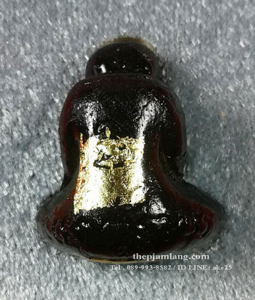 พระปิดตามหาสิทธิโชค หลวงปู่แก้ว วัดสะพานไม้แก่น สงขลา เนื้อผงพุทธคุณ จุ่มรัก ก้นปลอกลูกปืน ปี 2562