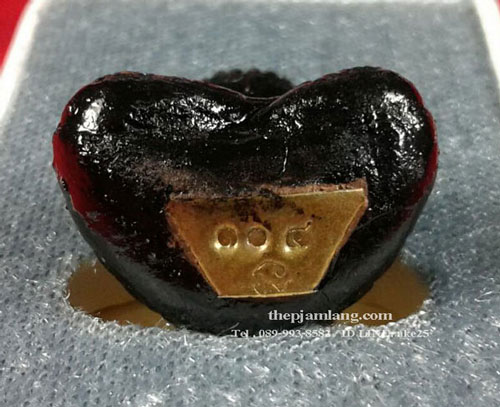 พระปิดตามหาสิทธิโชค หลวงปู่แก้ว วัดสะพานไม้แก่น สงขลา เนื้อผงพุทธคุณ จุ่มรัก ก้นปลอกลูกปืน ปี 2562