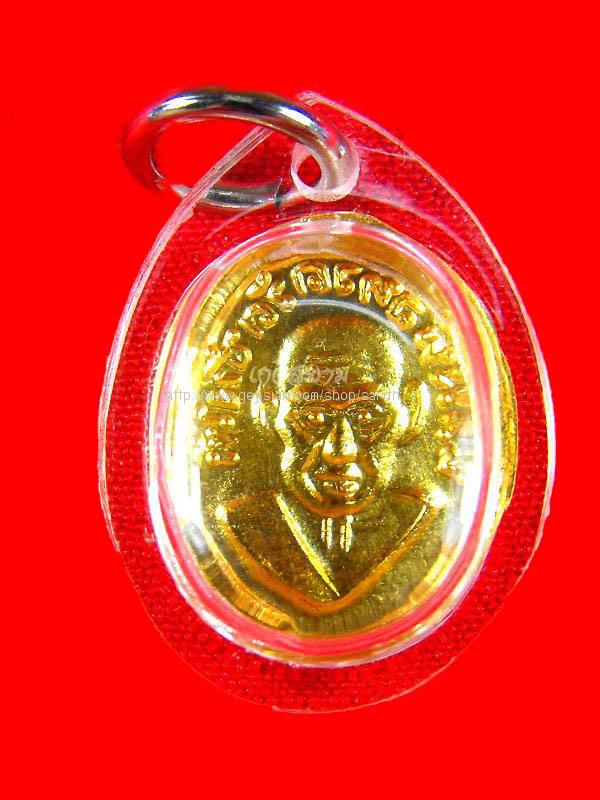 เม็ดแตงทองคำแท้ ปั๊มหลังแบบ หลวงพ่อทวด วัดช้างไห้ "รุ่นร้านทองสร้างถวาย ปี2508"