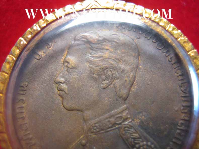 เหรียญรัชกาลที่ ๕ ร.ศ.๑๒๒ พระเศียรตรงกันเลี่ยมทองคำแท้พร้อมบัตรรับรองพระแท้*258