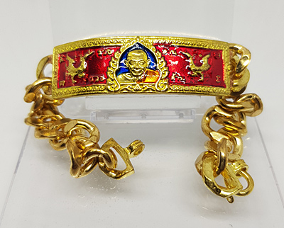 เลสข้อมือรุ่นแรกรวยรวยล้านล้าน หลวงปู่พระมหาศิลา สิริจันโท เนื้อทองทิพย์ลงยาแดง เคาะเดียว