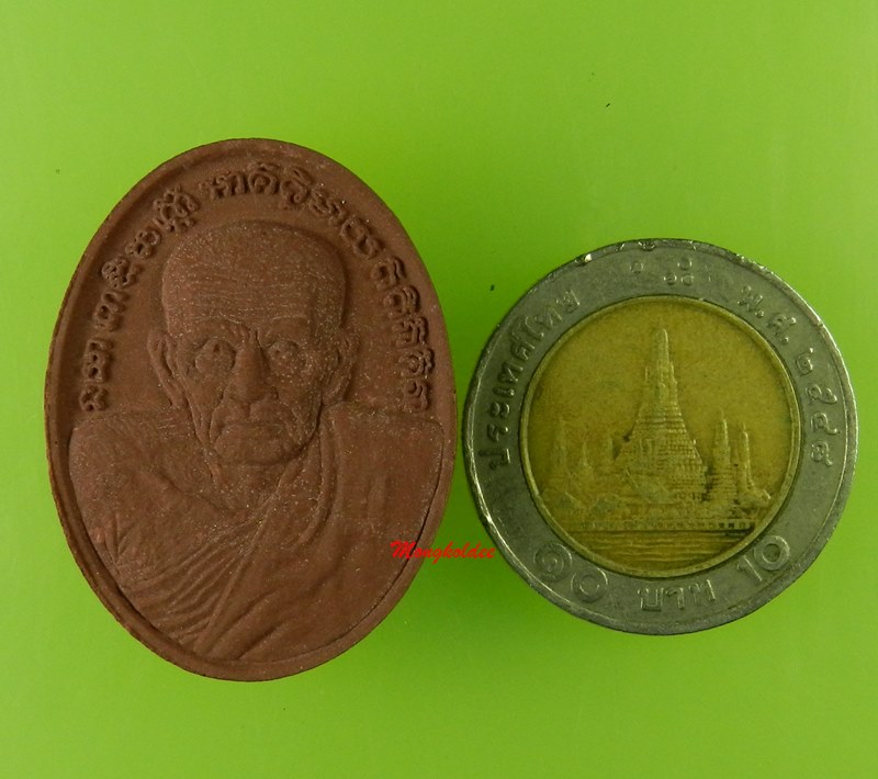 หลวงปู่ทวด รูปไข่ รุ่น ปาฎิหาริย์สองโพธิสัตว์ ปี2556 เนื้อว่านมงคลสีแดง No.103