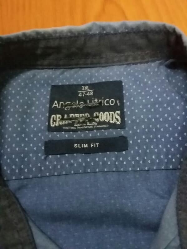 เสื้อเชิ้ตมือสอง  Angele   ไซร์XXL  เคาะเดียวครับ
