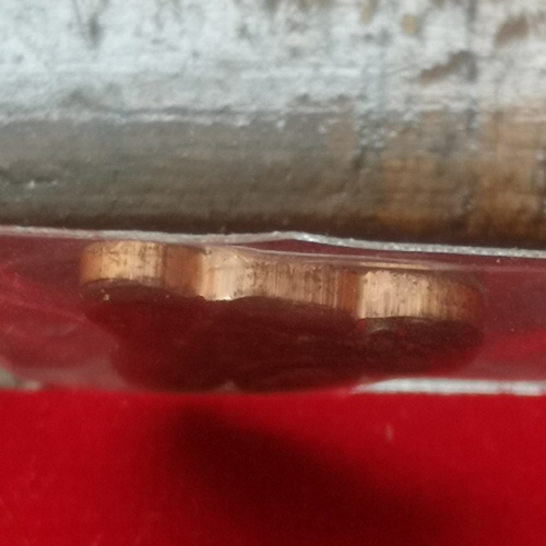 ปิดตา​หลัง​รูป​เหมือน​หลวงพ่อ​คูณ​ ปี 37 เนื้อ​นวะ