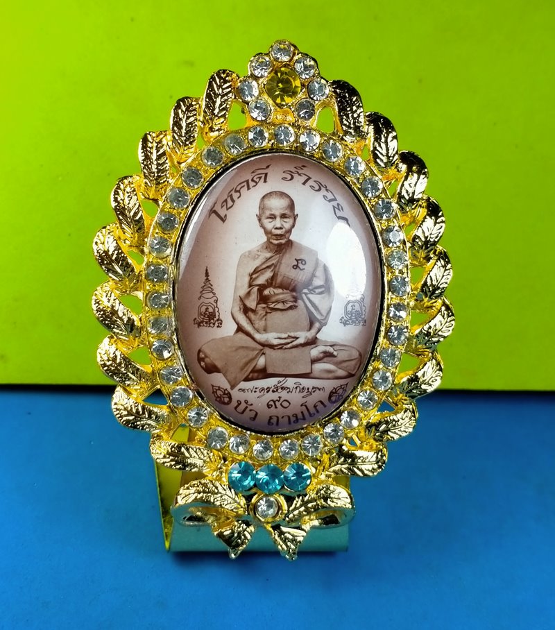 ล๊อกเก็ต หลวงปู่บัว ถามโก รุ่นโสฬสมงคล 90 ปี "เสริมบารมี โชคดี ร่ำรวย" ตั้งหน้ารถจัมโบ้