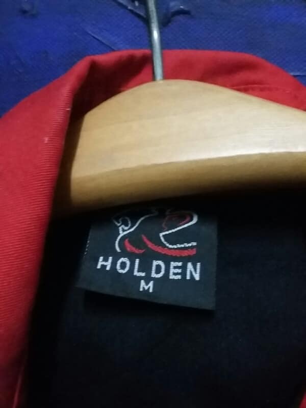 เสื้อมือสอง  HOLDEN  ไซร์  M เคาะเดียวครับ