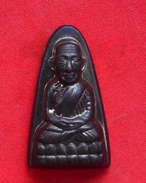   รูปหล่อปั๊มหลังเตารีด เนื้อทองแดงรมดำรุ่น ปาฎิหาริย์ วัดต้นเลียบ ปีพ.ศ. 2556