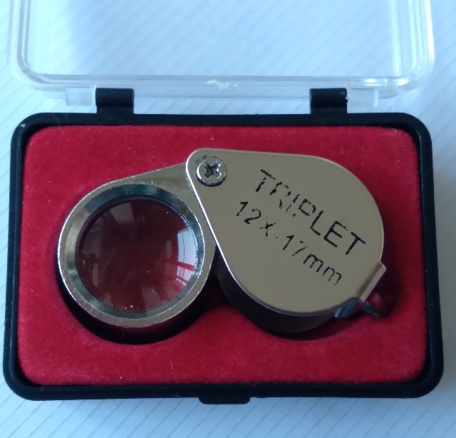 กล้องส่องพระยี่ห้อ triplet ขนาด12×17mm.