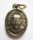 เหรียญเม็ดแตงหลวงปู่ทวด ด้านหลังพ่อท่านเขียว วัดห้วยเงาะ อ.โคกโพธิ์ จ.ปัตตานี รุ่นมงคล 80 ปี ปี2552